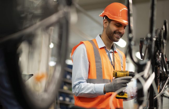 factoryy-worker-fp Factory worker in hard hat.