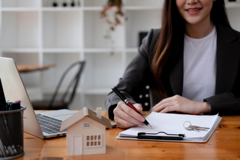 landlord reviewing documents related to California tenant laws for rental property compliance