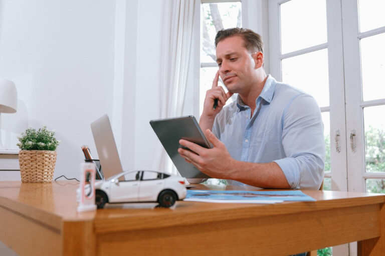 reviewing auto insurance discounts to lower premium