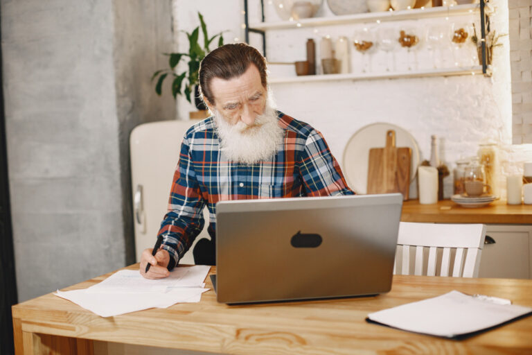 Remote worker reviewing home business insurance needs in a home office