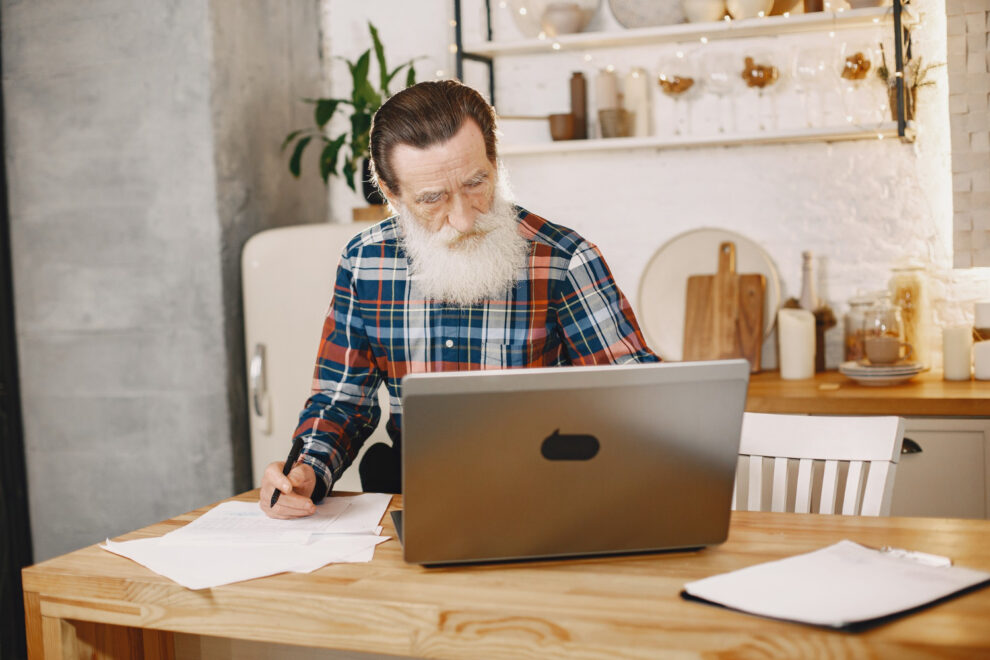 Remote worker reviewing home business insurance needs in a home office