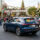 Does auto insurance cover theft? Car parked at a shopping center during the holiday season with shopping bags inside.